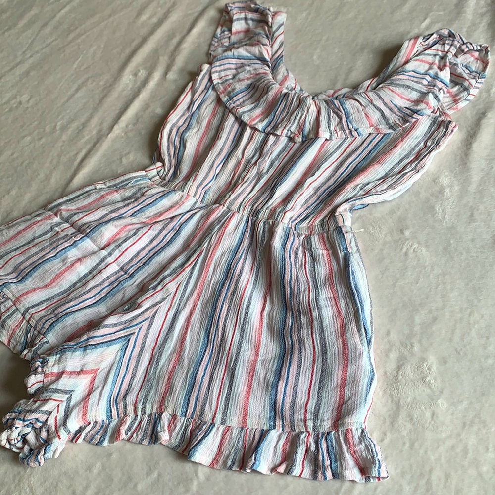 Poof! New York stripped woman’s romper Size S.